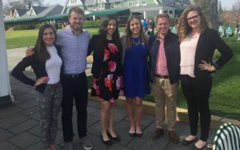 Students at the golf course for their class project