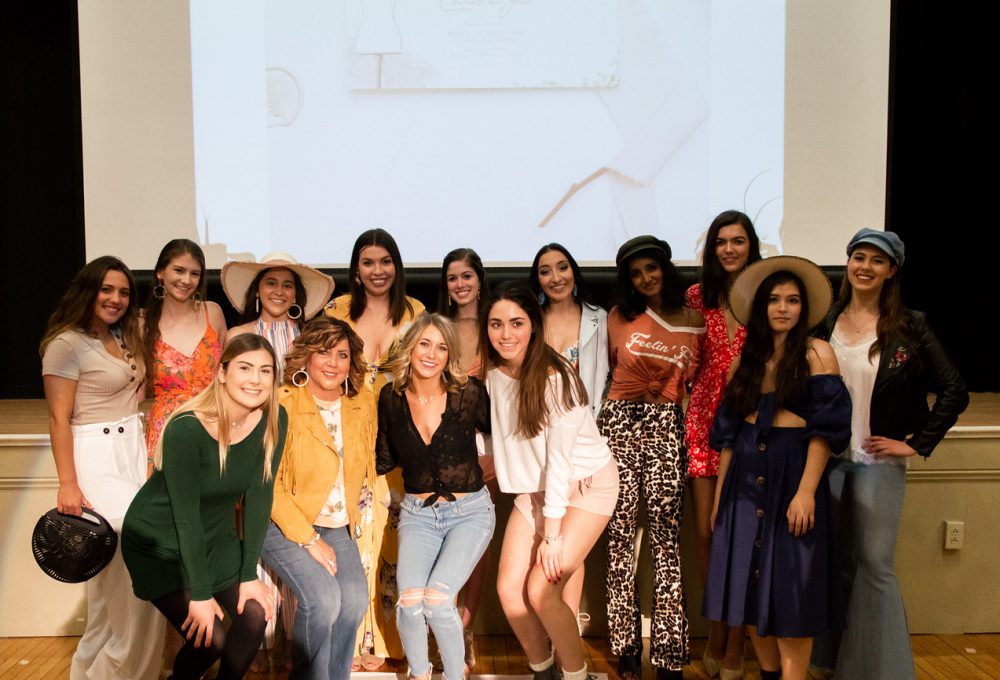 A group of all the girl students pose together for a picture