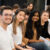 A group of students smile for the camera